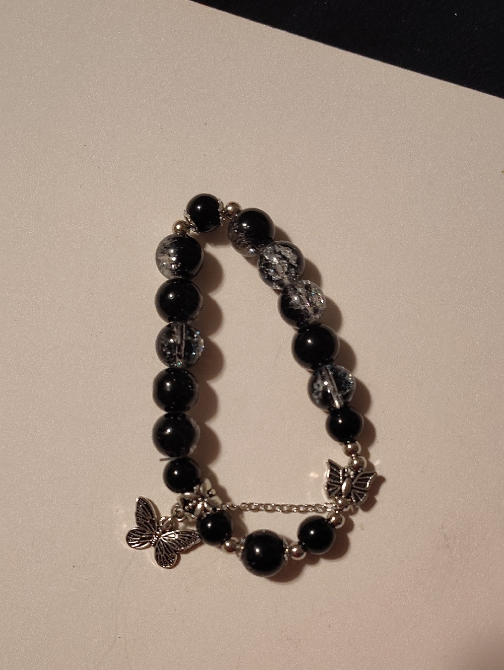Butterfly Charm Black Bead Bracelet